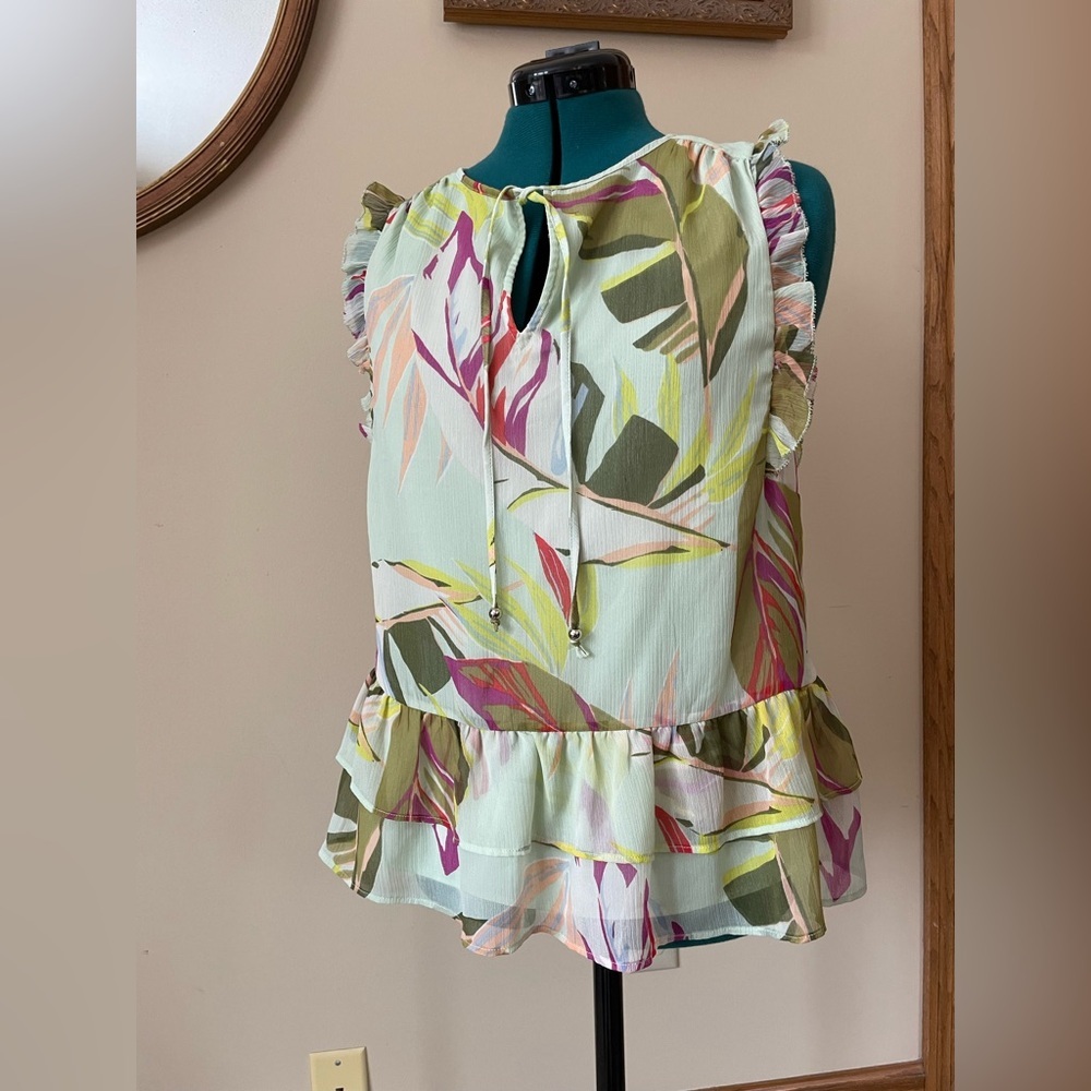 Kaari Blue size small lined ruffled sleeveless blouse with tie detail
